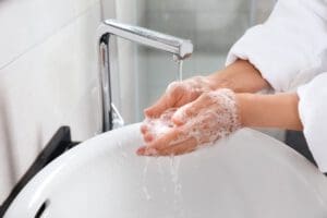 person washing hands