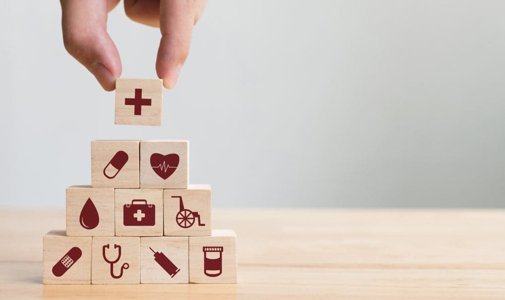https://www.nvisioncenters.com/wp-content/uploads/wooden-blocks-with-healthcare-symbols.jpg